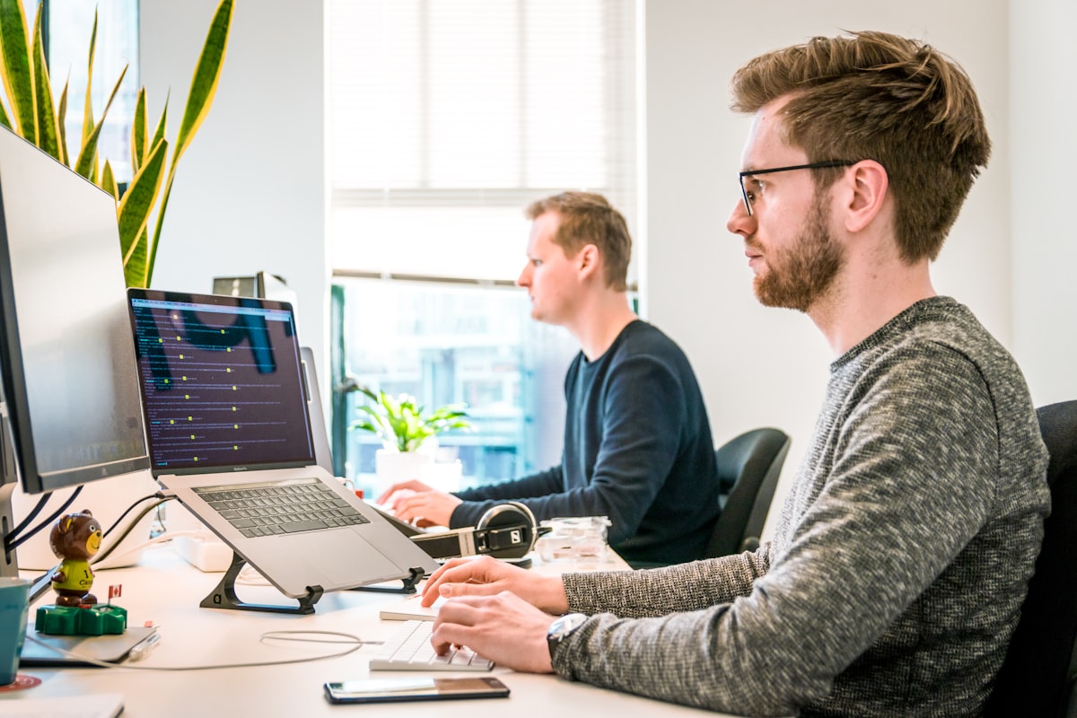 IT support engineers monitoring systems